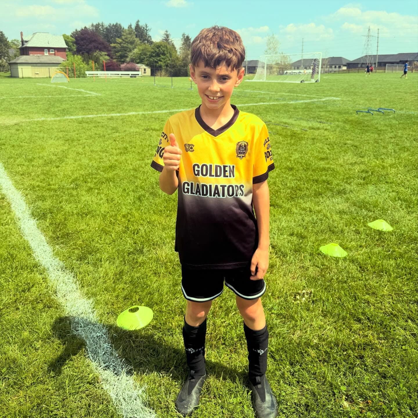 Player giving thumbs up during outdoor training